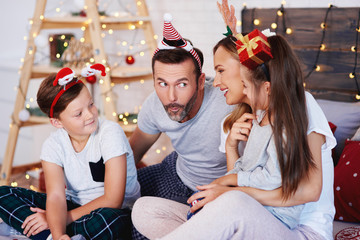 Obraz na płótnie Canvas Family celebrating Christmas together at home