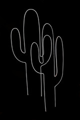 Naklejka premium Neon light in cactus shape on black background