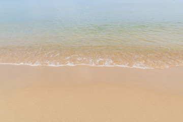 Fototapeta na wymiar Wave of the sea on the beach