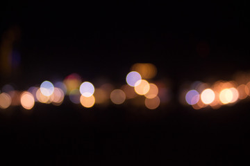 Colorful bokeh of the city in the midnight with blurred background