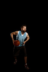 Obraz na płótnie Canvas Basketball player preparing to jump