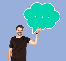 Happy man holding a speech bubble