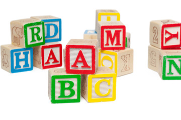 Wooden alphabet blocks isolated on white background