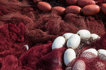 Detail of a fishing net with buoys