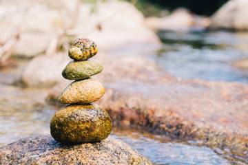 zen stones in the river