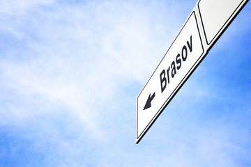 Signboard pointing towards Brasov