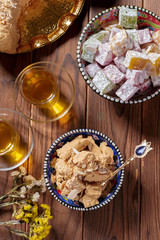 Tasty halva with tea on the table