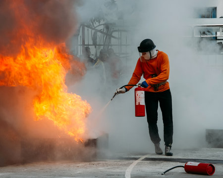 Man with extinguisher