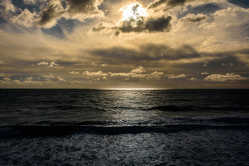 a hole of light on the sea