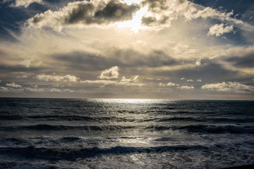 a hole of light on the sea