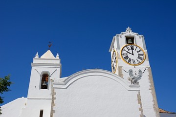 View of Santa Maria do Castelo church in the old town (Igreja de Santa Maria do Castelo), Tavira, Algarve, Portugal.