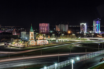 Fototapeta na wymiar The photo shows a piece of night Barnaul and a very beautiful Temple. 