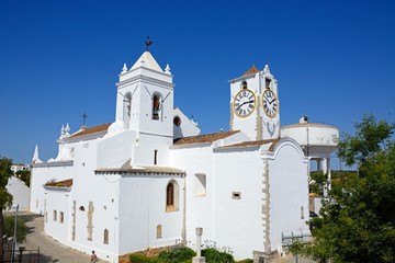 Elevated view of Santa Maria do Castelo church in the old town (Igreja de Santa Maria do Castelo), Tavira, Algarve, Portugal.