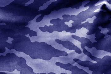 Camouflage cloth with blur effect in blue tone. © pavelalexeev