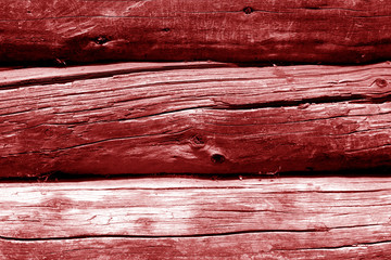Old wooden wall in red color.