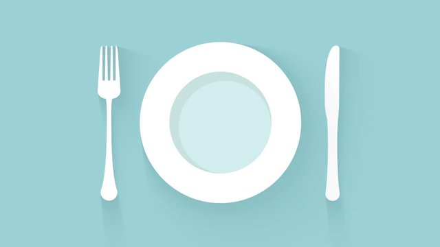 plate, knife and fork place setting on oblue background