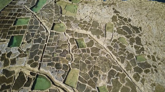 4k Drone Footage - Salt pans on the island of Gozo.  Country of Malta.