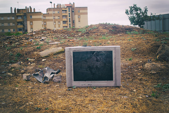 Old Broken TV On The City Dump