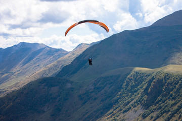 Aerial view. paragliding in mountains of Kazbegi.