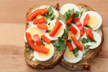 Sandwich with boiled egg and paprika.