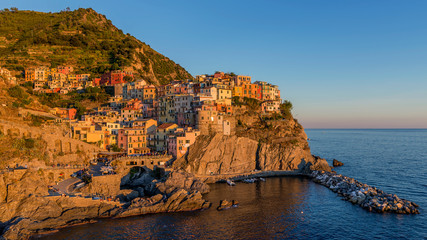 Fototapeta na wymiar Beautiful sunset on the village of Manarola, Cinque Terre, Liguria, Italy