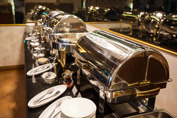 hotel restaurant food catering service buffet banquet for wedding ceremonies, seminar, meeting, conference, parties or event. Warm chafing dish, silverware, kitchenware, tools, tableware and utensils