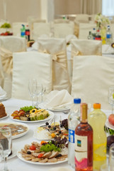 delicious dishes on the table in the restaurant. serving table. sharpness in the middle of the table