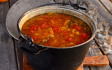 Close-up of hot beef hunting goulash or bograch soup with paprika, small egg pasta