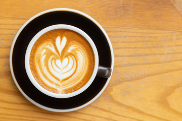 latte coffee on wood table