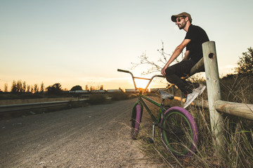 Young man with his bmx bike