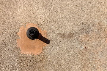 gas boiler flue outlet on exterior wall of retro british house