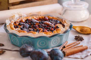 Homemade Plum Cake with Gooseberries and Blueberries. Shortcrust pastry