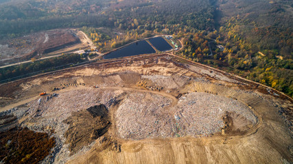 Aerial view of the big city dump. Smog formed in the sky