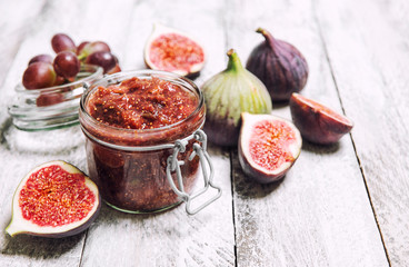 Figs jam in jar Fruit marmalade Homemade preserving - obrazy, fototapety, plakaty