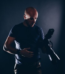 Shocked male photographer portrait in studio