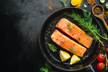 Raw salmon fish on vintage pan