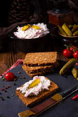 delicious homemade meat salad with mayonnaise and cucumber
