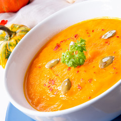 healthy pumpkin soup with ginger carrots and coconut milk