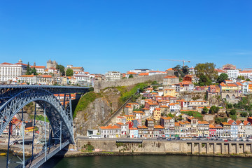 Fototapeta na wymiar Historic Iron Bridge of San Luis over the Douro River. In the city of Porto.