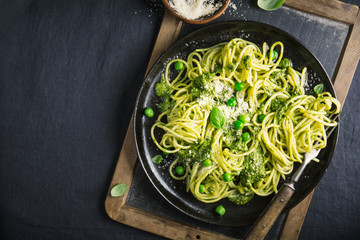 Tasty pasta with pesto served on plate