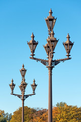 Fototapeta na wymiar Vintage vintage lanterns on a city street in the afternoon.