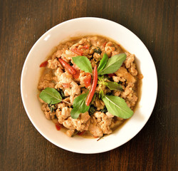 Rice topped with stir-fried pork and basil thai food, blur