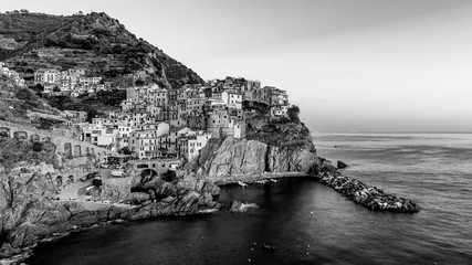 Beautiful black and white view of the village of Manarola at sunset, Cinque Terre, Liguria, Italy