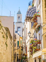 View of a narrow street in the Italian city Bari. Bari is the capital city of the Metropolitan City...