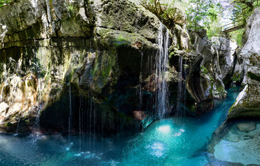 Naklejka premium Just above Lepena Valley close to Bovec the Soča (Isonzo) River has carved 750 meters long gorge named Velika Korita. The gorge is completely narrow at some points up to 15 m deep.