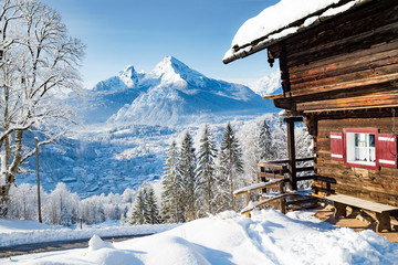 Traditional mountain cabin in the Alps in winter