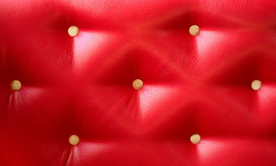 designer background or texture-red quilted leather close-up