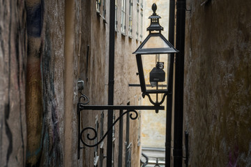 An old street lamp on the wall of a house in Stockholm