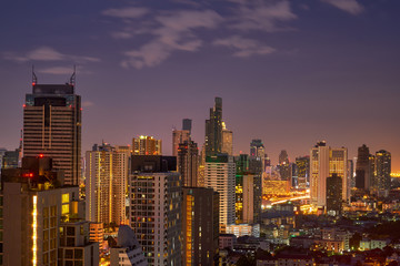 Fototapeta na wymiar scenic of night cityscape in metropolis with lighting building
