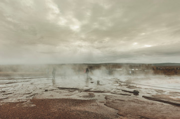Fototapeta na wymiar Strokkur (churn) fountain geyser in the geothermal area beside the Hvítá River. Haukadalur, Geysir - Iceland